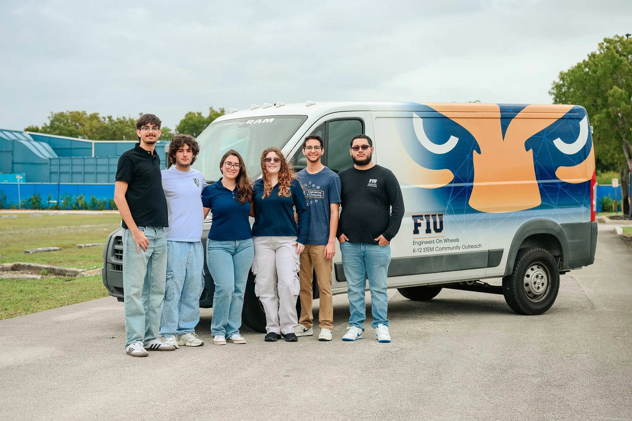 Students standing in front of Engineering on Wheels van