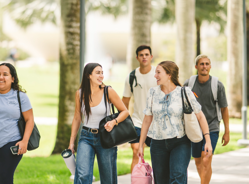 Students walking together and smiling 